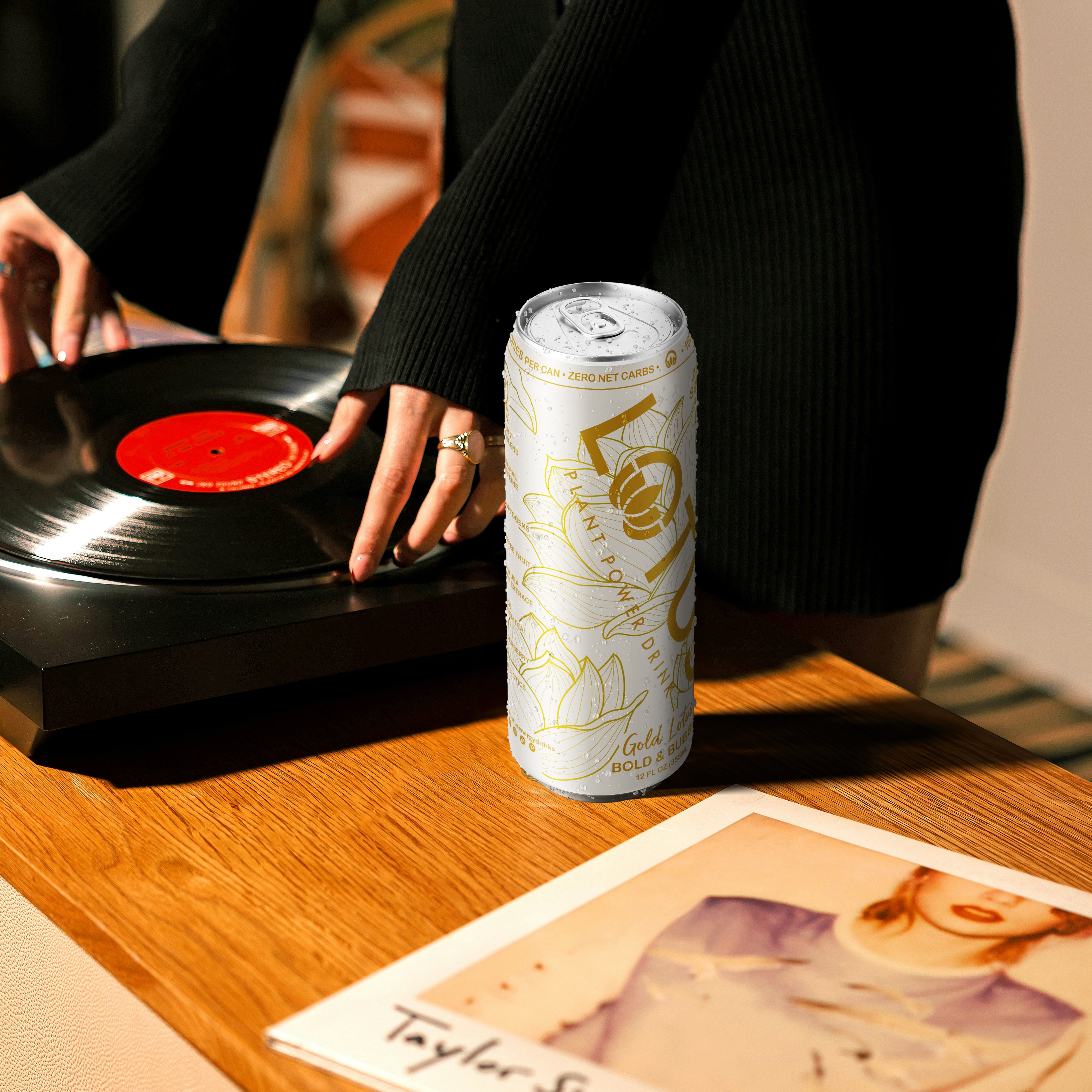 Gold_Lotus_Record_Player (1).jpg__PID:f4bd78ad-7d49-41e2-b32d-97fc5de23918