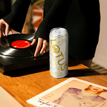Gold Lotus can with record player